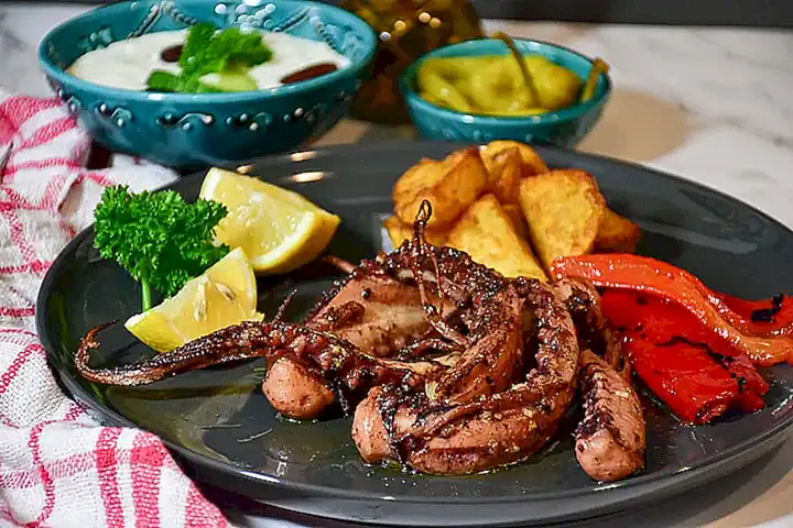Haz una paella de mariscos empleando el caldo de cocer pulpo para darle un sabor intenso